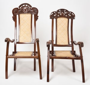 Two Rosewood Caned Folding Planter’s Armchairs