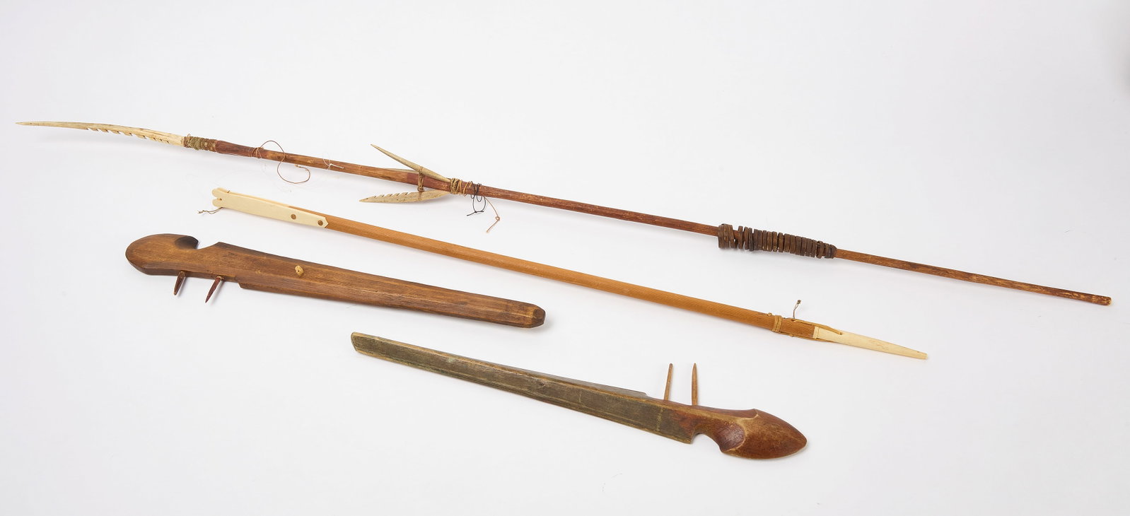 Two Inuit Bird Hunting Spears and Two Greenland Inuit Spears: Two Inuit bird hunting spears. Together with two more Inuit spears with whalebone tips. L 53-1/2" L 18". Greenland spear: L 33-1/2". Bone spears: L 6-1/4" L 4-1/2". Coll
