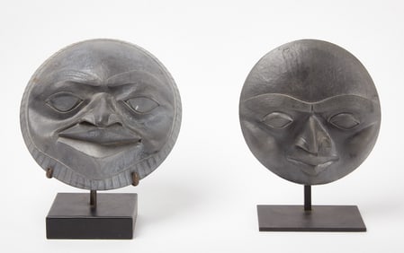 Pair of Carved Stone Masks