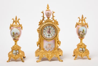 Three Piece Gilded Bronze and Porcelain Garniture Set