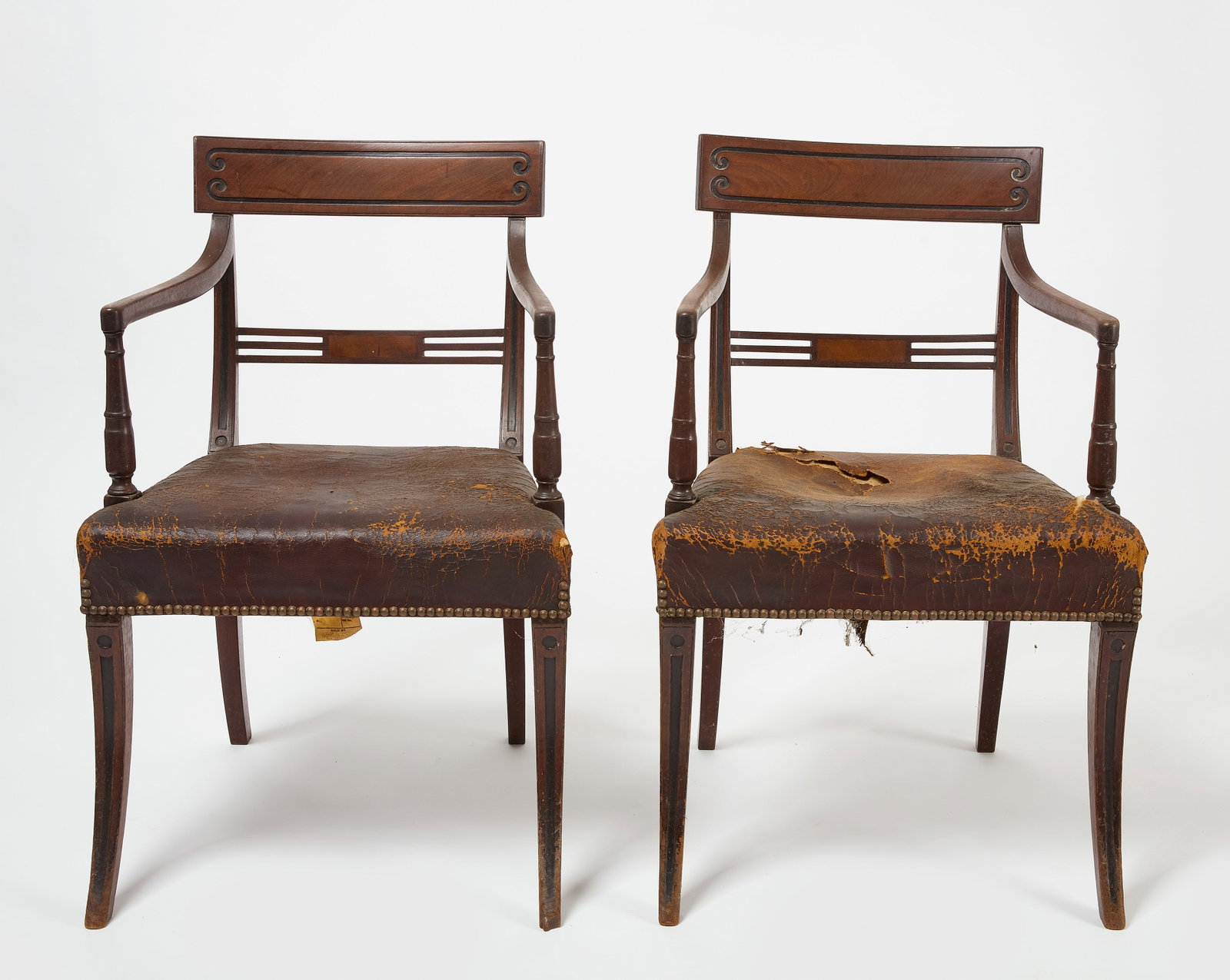 Pair of European Armchairs: Pair of European armchairs. Riveted leather seats. H 33-1/4" W 22" D 21-1/2" SH 18". Condition: Rip to one seat. Link to hi-res images: https://www.dropbox.com/scl/fo/p0z4o3ejaxjm3