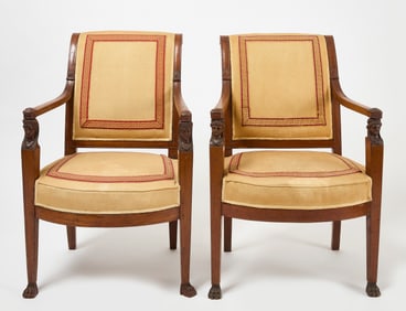 Pair of French Empire Armchairs with Carved Faces