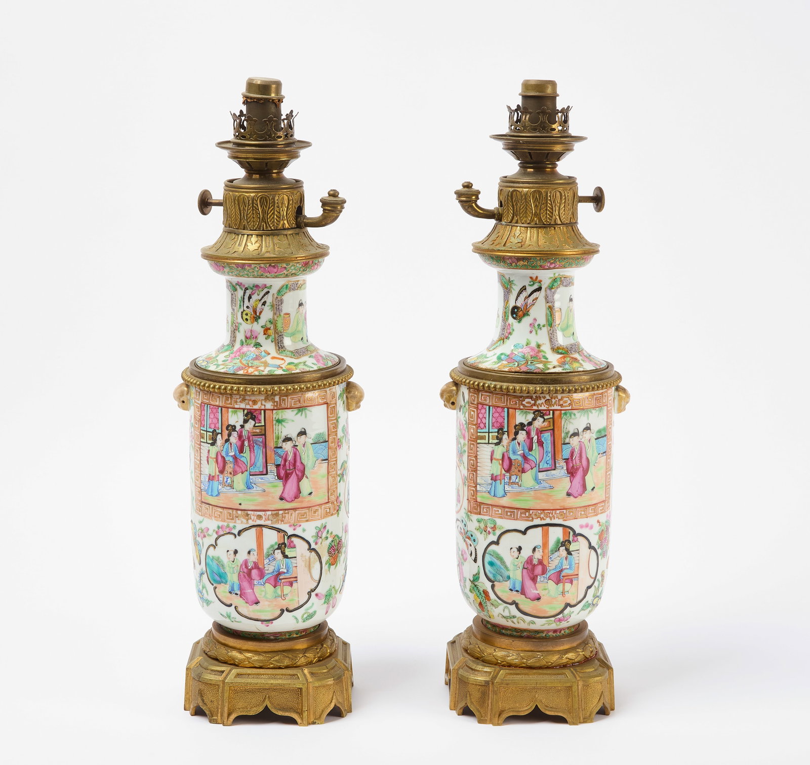 Pair of Chinese Porcelain Oil Lamps: Pair of gilded bronze mounted Chinese porcelain oil lamps. H 19". 19th century. Condition: No damage noted. Link to high-res imagews: https://www.dropbox.com/scl/fo/idbsgm1daszr22ba4e117/AHLDaegN