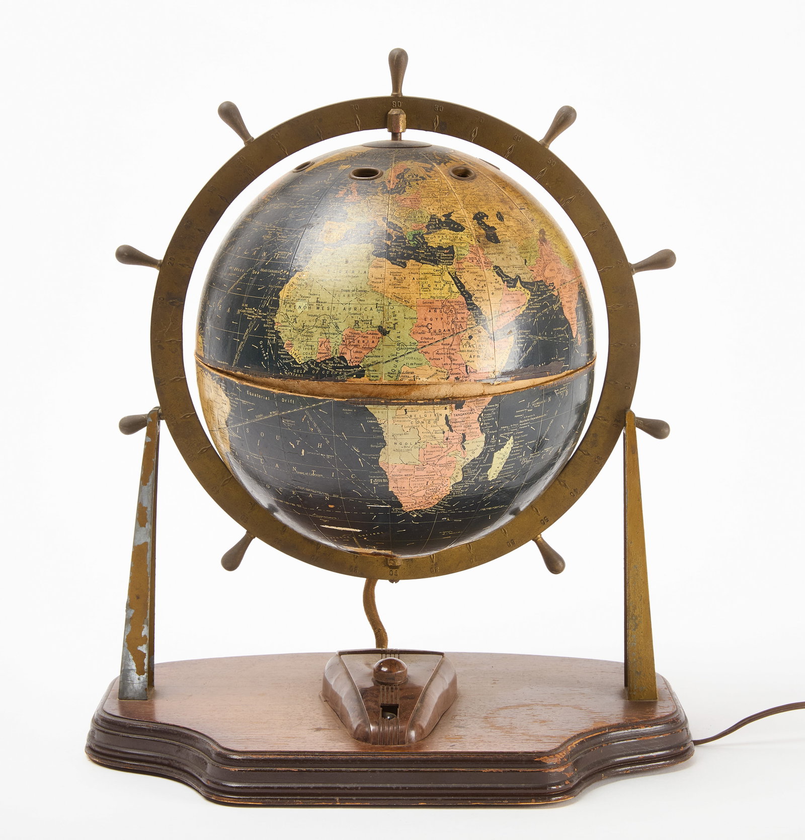 Navigator Radio Globe: Navigator radio globe. Wood, brass, and paper. H 17". Condition: Minor imperfections. Link to hi-res images: https://www.dropbox.com/scl/fo/nsk3ml2tqb97zfgst5gnl/AJK06O9hUhrK7hb3gXOnEgc?rlk