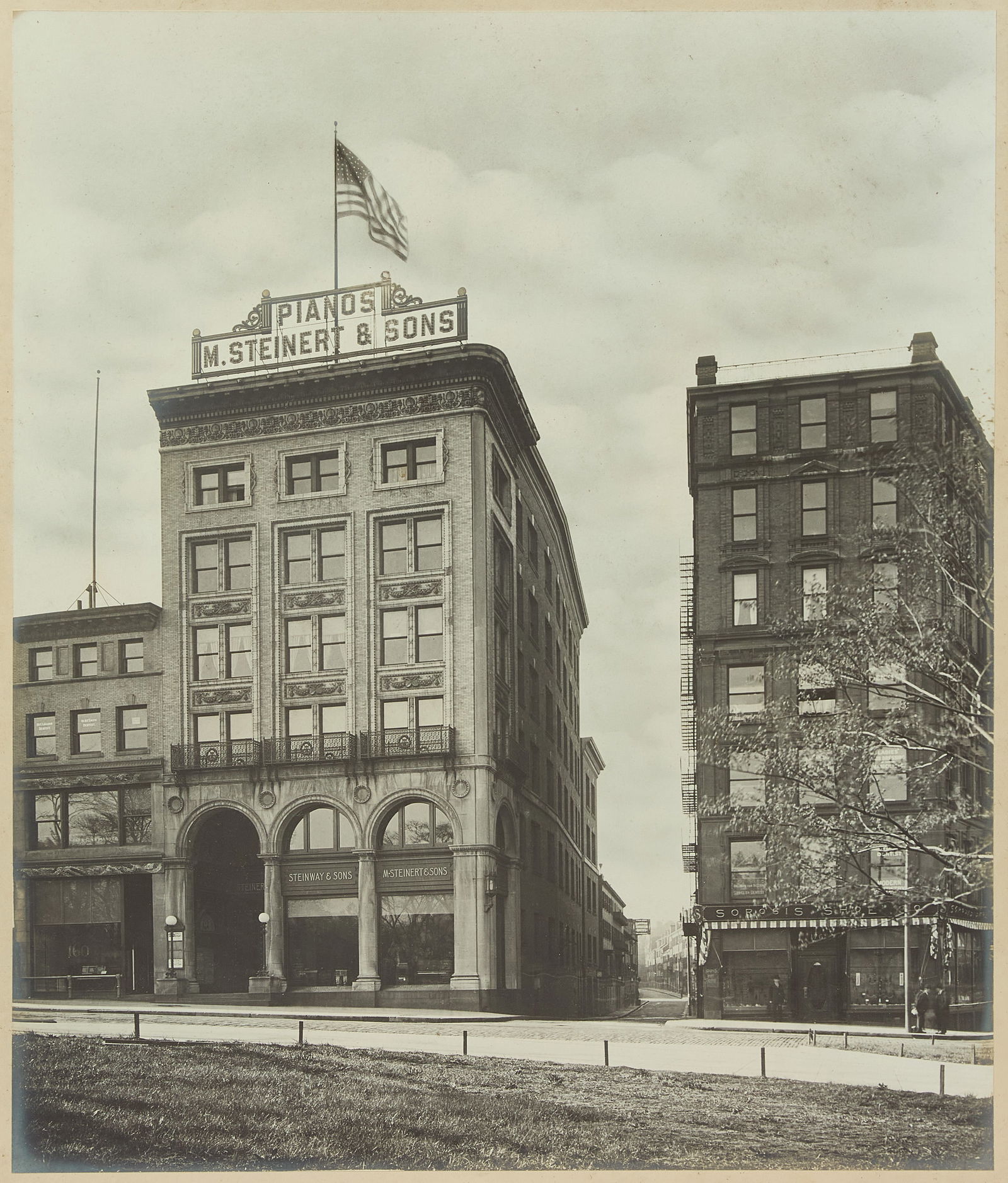 M. Steinert & Sons Pianos - Storefront Photograph: Photograph showing the outdoor street view of the M. Steinert & Sons Pianos building. New England, circa 1910. Frame: H 35-1/2 in. W 31-1/2 in. Sight: H 29-1/2 in. W 25-1/2 in. Co