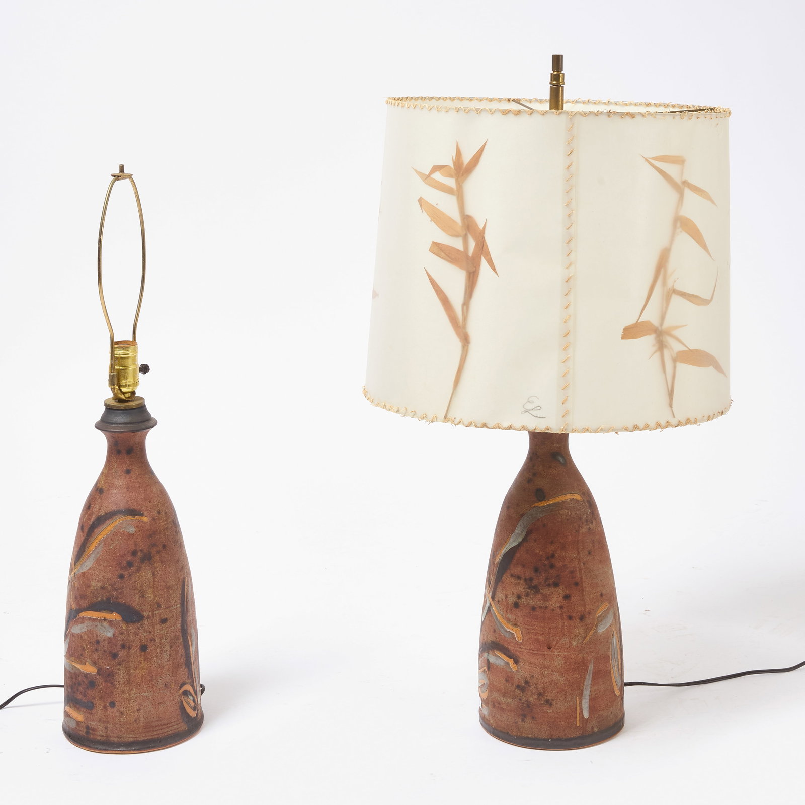 Pair of Berkshire Studio Pottery Modern Lamps: Pair of Berkshire Studio Pottery modern lamps. Original shades.H 27" D 15-1/2".Condition: Two matching shades are included (not pictured). Working condition.