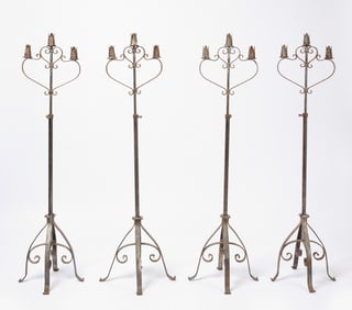 Four Wrought Iron Adjustable Standing Candleabras