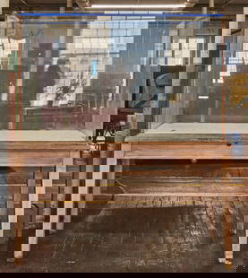 Museum Display Case: Museum display case. Wood and glass, circa 1920. H 76 in. W 65 in. D 35 in. Condition: Wear from age as expected. Missing top wooden border surrounding glass case. Delivery service on site the day of