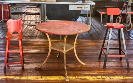 Two Red Industrial Chairs and Table