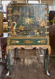 Fine English Chinoiserie Cabinet: English chinoiserie cabinet. Two doors with eleven total drawers. Queen Anne style legs. No key. H 54" W 40" D 22". Condition: minor imperfections.