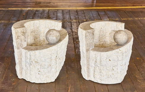 Pair of Marble Side Tables: Pair of modern marble side tables. Sloping half top ends with carved sphere. H 21" D 21". Condition: No damage noted.