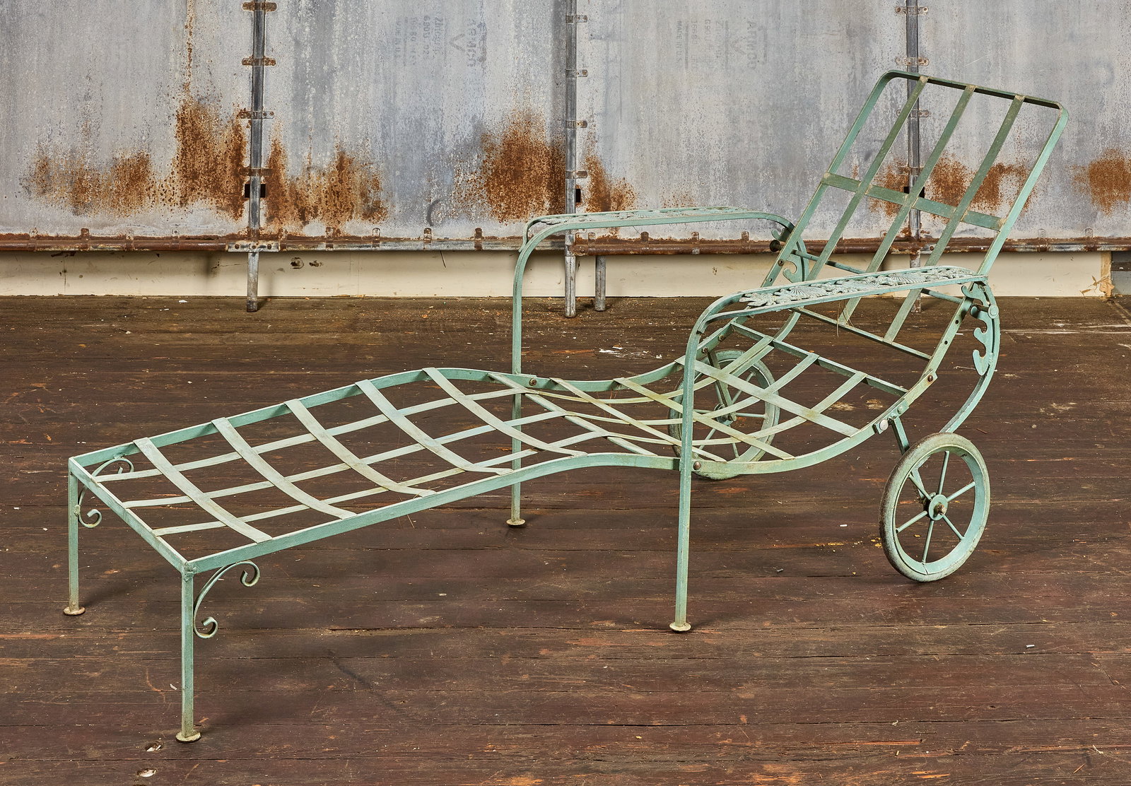 Chaise Lounge with Coral and Shell Motif: Chaise lounge with shell and coral motif arms. Painted steel. H 31" L 66" W 30-1/8".