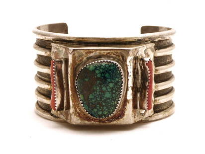 Henry Yazzie Zuni Cuff Bracelet: Henry Yazzie, Zuni cuff bracelet. Silver with turquoise and coral. Stamped HY. H 1-1/2 in. W 2-1/2 in. D 2-1/2 in. 3.44 ozt. Condition: Wear to front face of bracelet as expected, no damage
