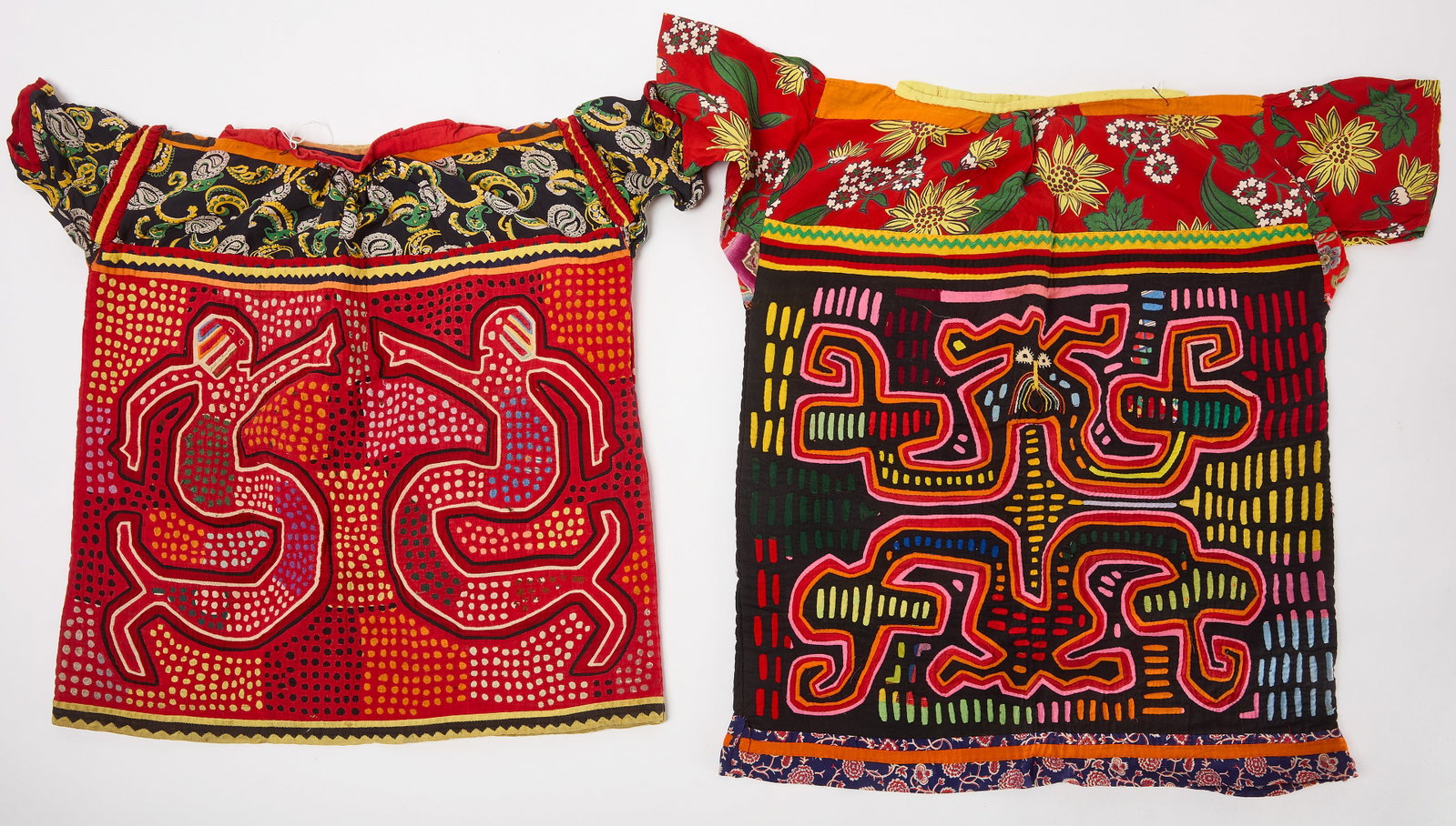 Two Mola Shirts: Two Mola shirts. Panama (Kuna). 20th century. Both Approx.: H 24-5/8 in. W 29 in. Condition: Wear to edges and seams from age. Colors still vibrant. Link for high-res images: ht