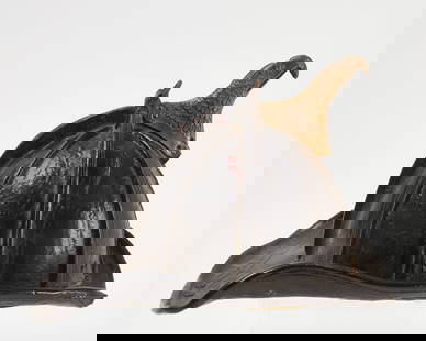 Fire Helmet: Fire helmet. Leather with embossed brass eagle topper. Cairns & Bros Makers, New York. H 9 in. W 9-1/4 in. D 13-1/4 in. Condition: Surface wear, loss to front of brim.Â