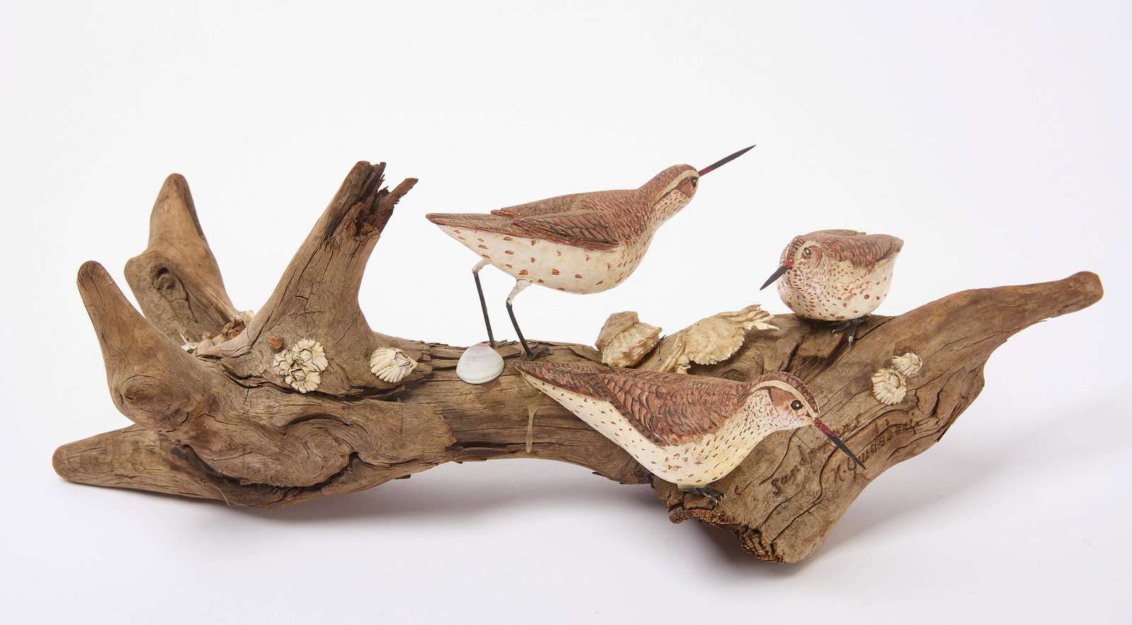 Contemporary Carving Trio of Shorebirds: Carving of a trio of shorebirds. Signed 'Maureen & Jerry'. Contemporary. H 5-1/2 in. L 15-1/2 in. Condition: Some old glue spots. Minor surface imperfections. Link to high-res i