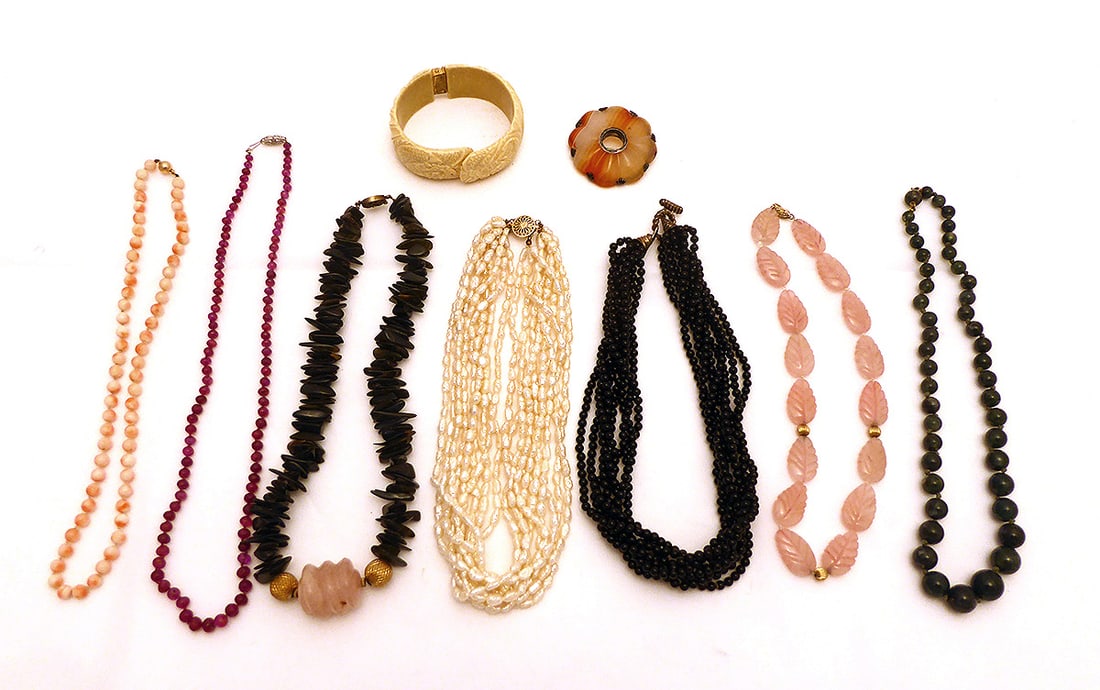Seven Necklaces , Stone Brooch, and Spring Cuff Bracelet: 1) Rose quartz necklace, leaf beads with three gold beads. L 16 in.2) Round stone flower brooch with silver accents. No marks. H 2 in. W 2 in.3) Nine Strand Freshwater Pearl Necklace. 14k GF cla