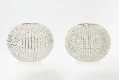 Pair of Hollywood Regency Hanging Fixtures: Pair of Hollywood Regency hanging fixtures, faceted clear glass shades. Constructed with heavy plated wire. Each with hundreds of faceted, graduated cut glass beads. Finely crafted. Circa 1970.H 9