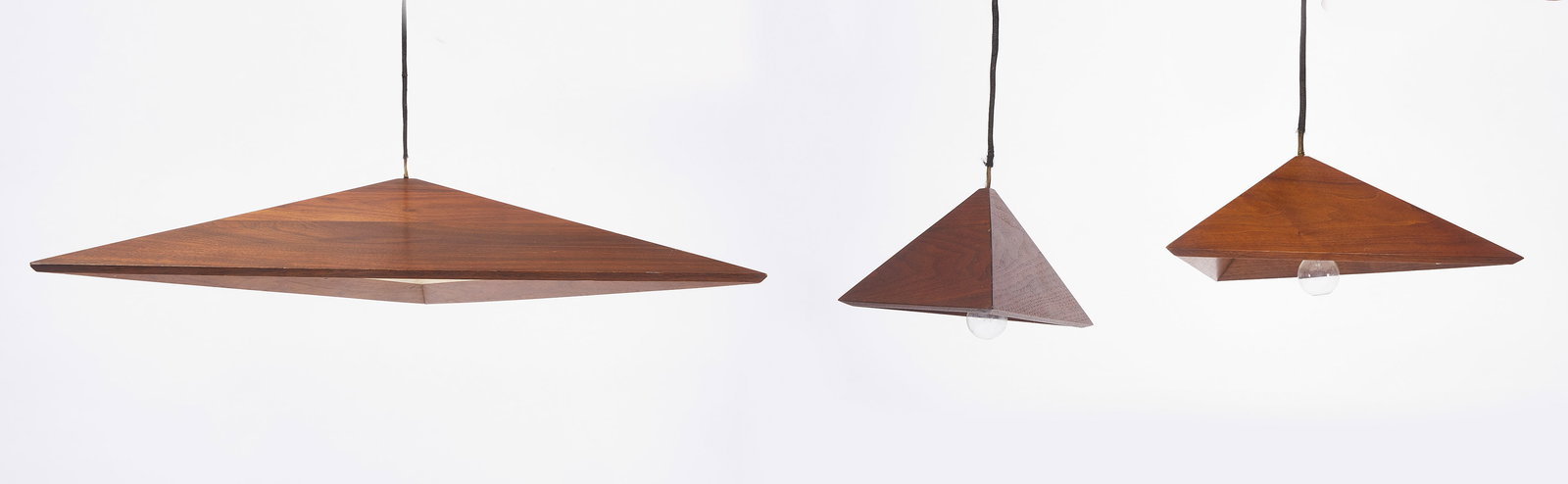 Set of Three MCM Pyramid Lights: Set of three MCM pyramid lights. Walnut wood. American, circa 1965. H 5 in. L 28 in. W 29-1/2 in. H 5 in. L 12-1/4 in. W 14 in. H 5 in. L 9 in. W 10 in. Cond