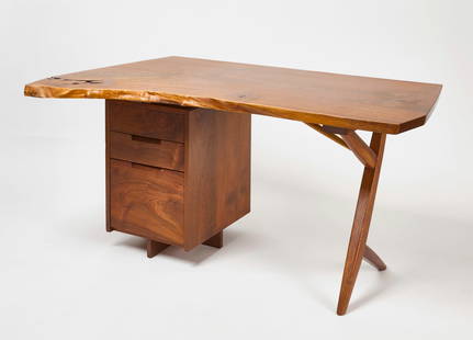 George Nakashima - Cross-Legged Desk: George Nakashima (1905-1990) - cross-legged desk. Circa 1980. One of the leading innovators of 20th-century furniture design, George Nakashima was an American woodworker, architect, and furniture make