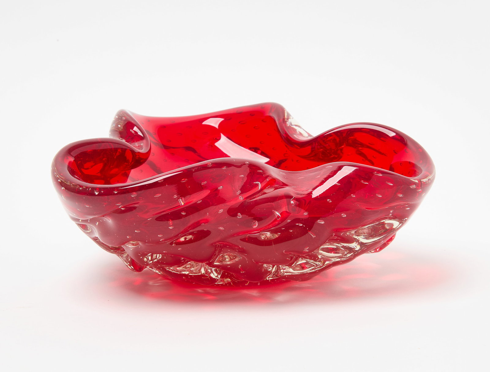 Large Bullicante Murano Bowl: Large red Bullicante Murano glass bowl with control bubbles. Italy, circa 1960. H 4-1/2 in. D 10-1/2 in. Condition: Minor surface imperfections. No damage noted. Link to high-res images: https://
