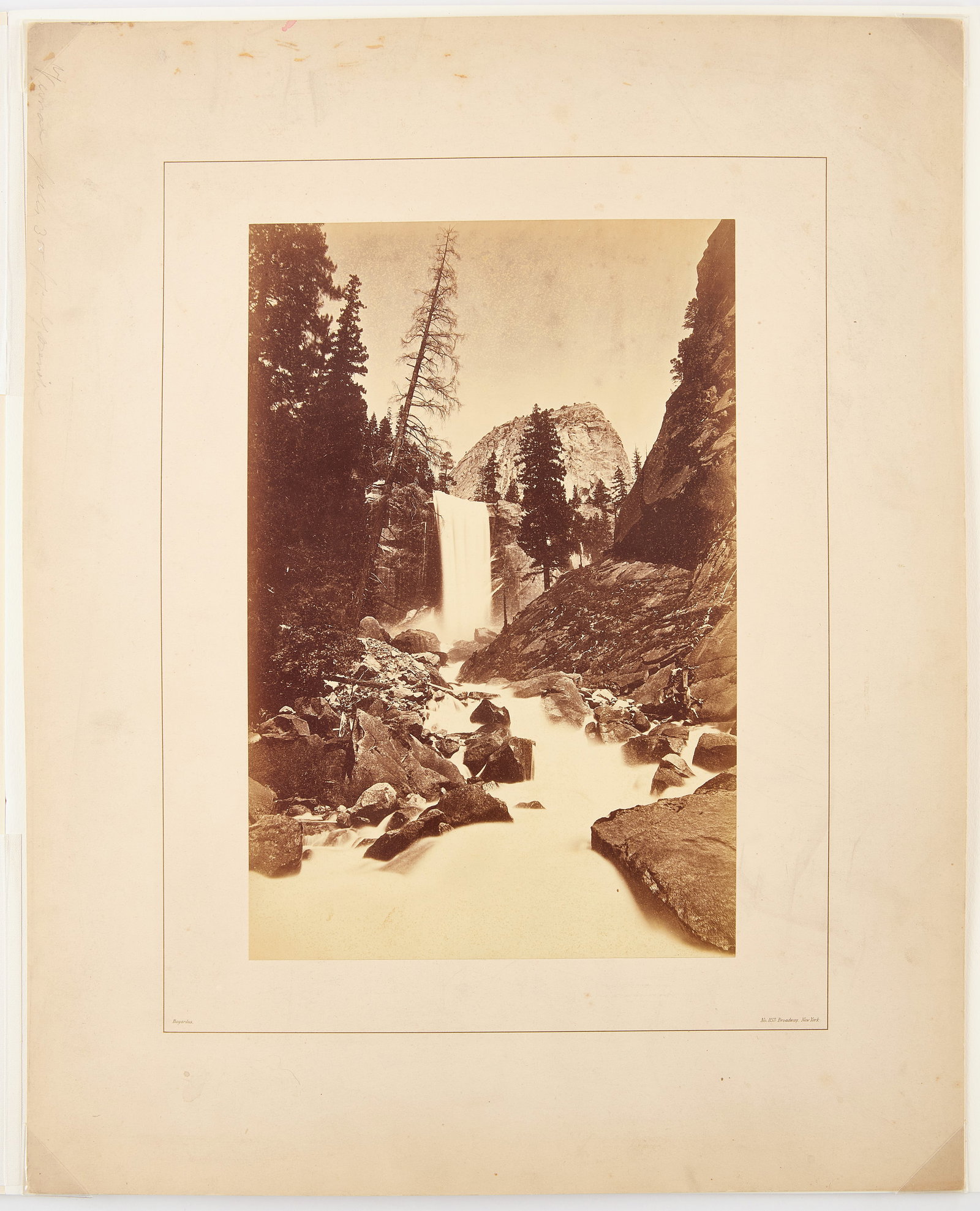 Carleton E. Watkins - View of Vernal Falls at Yosemite, Photograph: Carleton E. Watkins (attr. (1829-1916))- Albumen photograph print on board of Vernal Falls at Yosemite Falls. Printed 'Bogardus' in LL corner, below photograph. Bogardus was mostly k