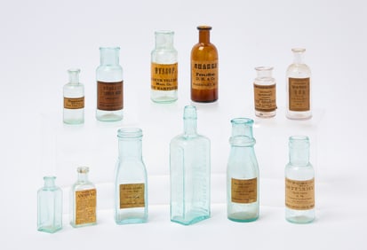 Group of Twelve Shaker Glass Bottles