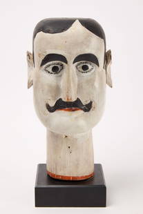 Carved Folk Art Head of a Man: Folk art head of a man. Carved wood with original paint. American, circa 1900. H 15 in. (w/o base) Condition: Original paint and condition. Professionally based. Provenance: Ex-Collection of Ron and P