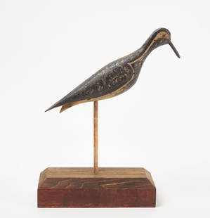 Shorebird Decoy: Shorebird decoy. Carved wood with original paint. Tack eye and split tail. American, first half of the 20th century. L 12-1/4 in. Condition: Lightly hit with shot. Link to high-res images: https://www