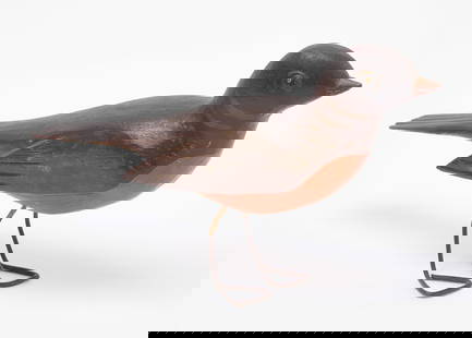 Gus Wilson Robin: Gus Wilson carved and painted robin. American, first quarter of the 20th century.H 5-1/2 in. L 10-1/2 in. W 2-1/2 in.Condition: Original condition. Minor imperfections; overall