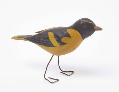 Gus Wilson Finch: Gus Wilson carved and painted finch bird. American, first quarter of the 20th century.H 4-1/2 in. L 8 in. W 2-1/4 in.Condition: Original condition. Minor surface imperfections.Link to high-res