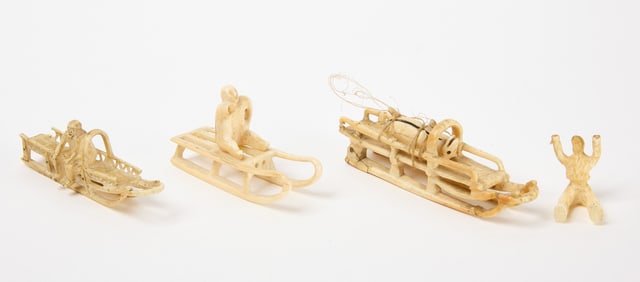 Three Inuit Carved Sleds with Riders