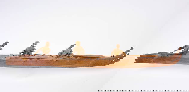 Alleut Eskimo Kayak Model: Alleut Eskimo kayak model with three figures holding paddles. Wood, leather, beads. Alaska, 19th century. H 6-5/8 in. L 30 in. W 3-1/2 in. Condition: Some wear and two paddles with broken handles but