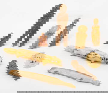 Group of Small Carved Inuit Figures: Group of eight small Inuit figures. Five human figures. Two carved wood, three carved bone.&nbsp;One human face. Carved bone.&nbsp;Two animals. Carved bone. Alaska,&nbsp; Smallest: L 1 in. Largest: 3-