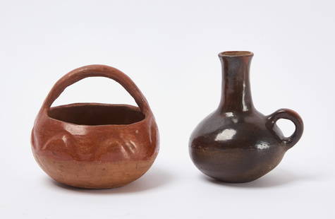 Two New Mexico Indian Pueblo Pottery Pieces: Two New Mexico Pueblo pottery pieces. A bottle with handle and bowl with a handle. The bottle is in a two toned (gloss/matte) finish. Label on the bottom reads: &quot;G[ua]ranteed Hand-mad[e] San Juan