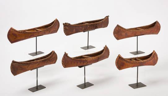 Group of Six Native American Birch Bark Canoe Models: Group of six Native American Model canoes. Display stands included. North America, early 20th century. L 13-1/2 in.&nbsp;to L 19 in.&nbsp; Condition: Minor imperfections, overall very good. Link to hi