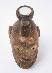 African Mask: African mask. Carved wood with small mirror inset on top piece. Africa, mid 20th century. H 14 in. W 7 in. D 8-1/2 in.&nbsp; Condition: Minor old fractures, surface wear.&nbsp; Link to high-res images