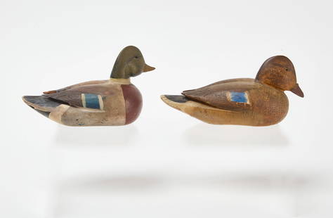 Pair of Miniature Duck Decoys: Pair of&nbsp;miniature duck decoys. Carved wing detail. Carved wood with original&nbsp;&nbsp;paint. American, circa 1940. H 3-1/2 in. W 6-1/4 in. H 3 in. W 6 in. Condition: Original condition. Minor i
