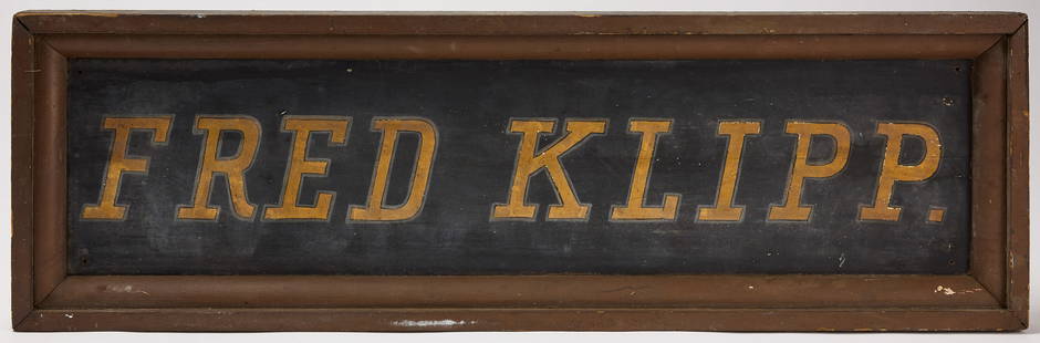 Fred Klipp Trade Sign: Fred Klipp trade sign. Gilt paint on wood, in wood frame. American, early 20th century. H 14-1/2 in.&nbsp;W 46-1/2 in. Condition: Original condition with minor imperfections.