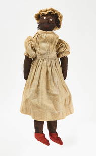 Afro-American Rag Doll with Red Shoes: Afro-American rag doll with red shoes.&nbsp;Fabric doll and clothing with button eyes, embroidered mouth. Wearing dress secured with button, underskirt and bloomers trimmed with lace, and red hide sho