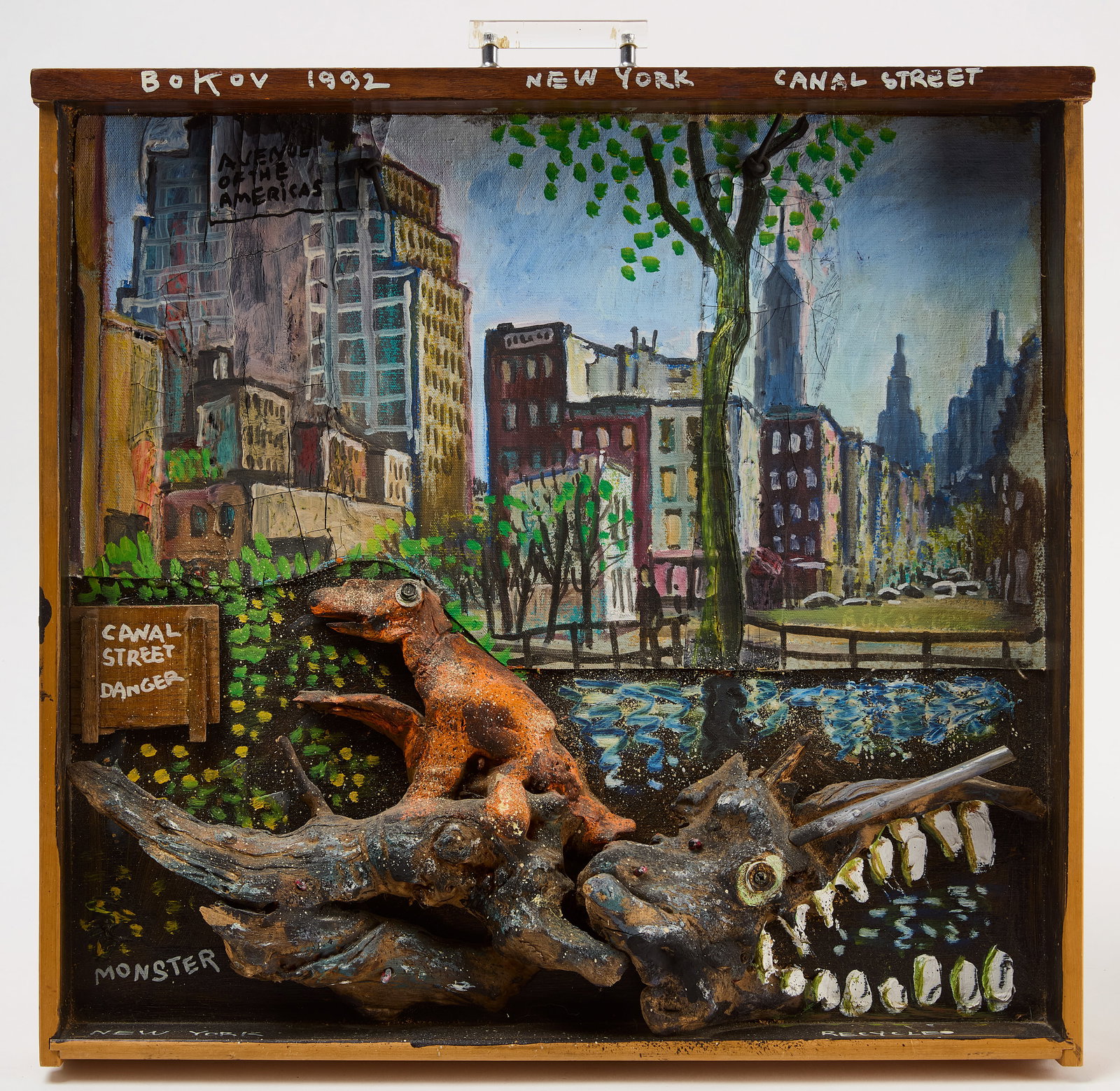 Konstantin Bokov - New York Mixed Media Collage: Konstantin Bokov (b. 1940) - Mixed media collage of New York (Canal Street) which shows two 3-dimensional dinosaur figures situated in a cityscape. Signed with artist's last name and dated 1992 in