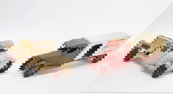 Two Pressed Steel Trucks - Fro Joy Ice Cream and Play Boy Trucking Co.: Two painted pressed steel trucks. First, &#39;Fro-Joy Ice Cream&#39; delivery truck. Together with a flatbed play boy trucking co.&nbsp; H 6-7/8 in. L 21-5/8 in. W 5-3/4 in. H 6-3/4 in. L 20-1/4 in. W