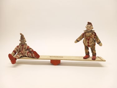 Two Schoenhut Clowns and Teeter-Totter