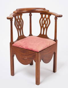 Chippendale Corner Chair: &nbsp;Chippendale corner chair with shaped apron and pierced splats. Mahogany. American, circa 1790. H 32-1/2 in. W 27 in. D 24 in. SH 17 in. Condition: Original condition with minor imperfections. Li