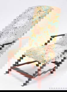 Lolling Chair: Lolling chair with floral upholstery. Mortise and peg construction. New England, circa 1820. H 45 in.&nbsp;W 27 in.&nbsp;D 25 in.&nbsp;SH 17 in.&nbsp; Condition: Excellent condition. Link to high-res