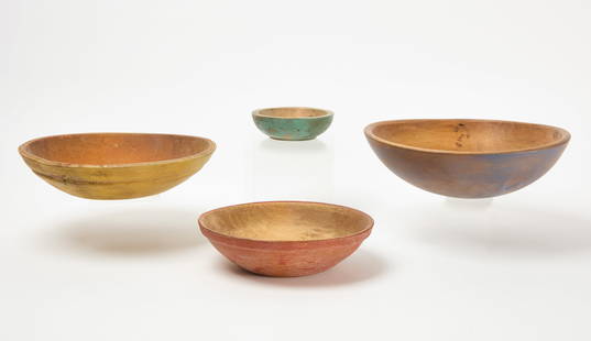 Four Painted Wooden Bowls: Four wooden bowls&nbsp;in old or original paint. American, late 19th century. Largest: D 13-3/4 in. Smallest: D 5-7/8 in. Condition: Yellow bowl with two splits at the&nbsp;rim (2-3 in.). Others excel