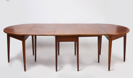Banquet Dining Table: An&nbsp;early banquet dining table with slightly tapered legs. Pegged construction. A dropleaf table can be unfolded and extended with demilune tables to create a large table. American, early 19th cen