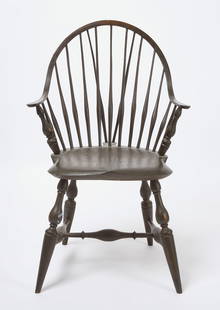 Eldred Wheeler Continuous Arm Windsor Chair: Continuous arm Windsor chair in green paint. Retains label on underside of seat. Label says 'warranted Cabinet Work of All Kinds: Made and Sold by Eldred Wheeler at their shop... Hanson, MA&#
