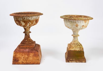Two Cast Iron Urns