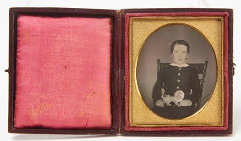 Daguerreotype of a Young Boy holding a Toy Lion